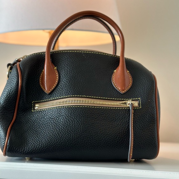 Dooney and Bourke black and tan purse. - Picture 2 of 4